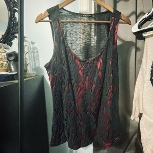 Black lace over red tank top